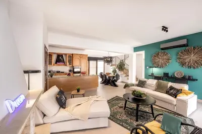 a living room with two couches and a table at SunnyVillas-3BR New Modern Villa-Private Pool-HVN in Paralimni