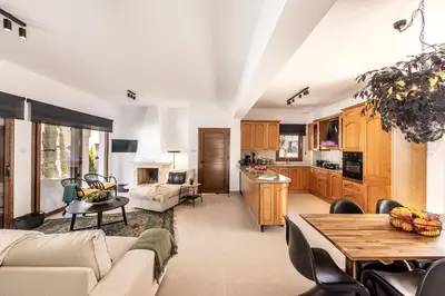 a living room with a couch and a table at SunnyVillas-3BR New Modern Villa-Private Pool-HVN in Paralimni