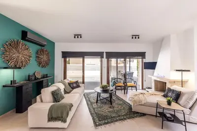 a living room with white furniture and green walls at SunnyVillas-3BR New Modern Villa-Private Pool-HVN in Paralimni
