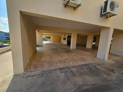 an empty hallway of a building with an empty floor at STEFARIS sea & mountain view in Larnaka
