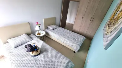 an overhead view of a room with two beds at City Center: Your Urban Retreat- 100m to the beach in Larnaka