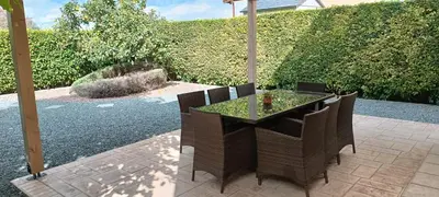 a table and chairs sitting on a patio at Sunrise Villa in Pervolia