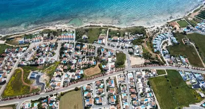 an aerial view of a crowded city next to the ocean at Thekla Oasis Villa in Ayia Napa