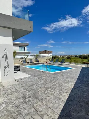 a view of a swimming pool in a villa at Protaras Rustic Paradise Luxury Villa 1 in Paralimni