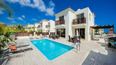 an image of a villa with a swimming pool at Kapparis Holiday Villa 018 in Protaras