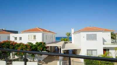 a view of the ocean from the balcony of a apartment at Pernera Holiday Villa 015 in Protaras