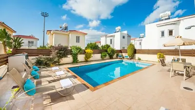 a swimming pool in the backyard of a house at Ayia Napa Holiday Villa 003 in Ayia Napa