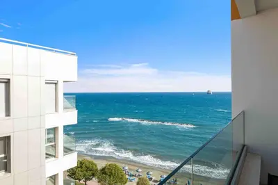 a view of the ocean from a building at Phaedrus Living Coastal Seaside Residences 04 in Limassol