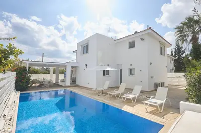 a villa with a swimming pool and a house at Protaras Serifos Villa Sv07 in Paralimni