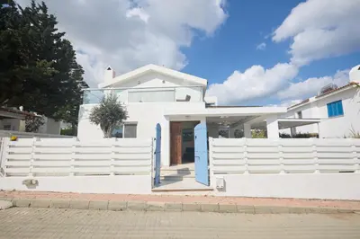 a white house with a white fence at Protaras Serifos Villa Sv07 in Paralimni