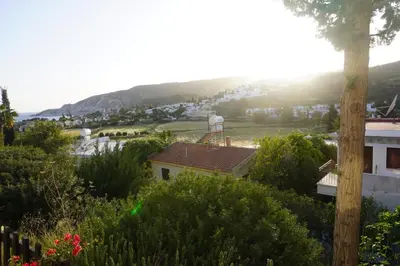 a view of a house with a water tower on the roof at Skeleas Apartments in Pissouri