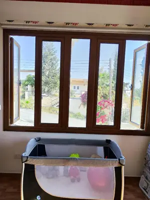 a sink in a room with a window at Mariam Apartment in Larnaka