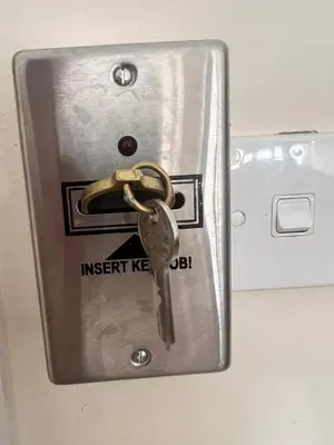 a metal door with a key on it at Villa Calm 100m from the beach in Ayia Napa