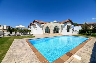 a swimming pool in the backyard of a villa at Kymma Bungalow #2 in Ayia Napa