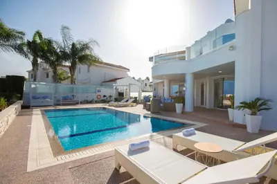 an image of a house with a swimming pool at Protaras Holiday Villa 113 in Protaras