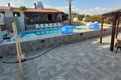 a house with a swimming pool with a house at Despol Villa in Alaminos