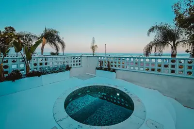a view of the ocean from the balcony of a building at Q Coconuts Seaside Suites in Limassol