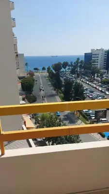 a view of a city street from a balcony at Balcony Sea View Whole Apt, Minutes To Beach in Limassol