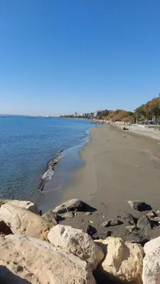 a view of a beach with rocks and water at Balcony Sea View Whole Apt, Minutes To Beach in Limassol