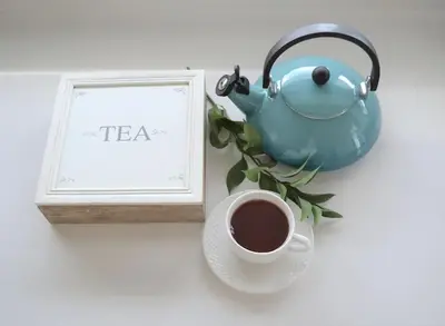 a teapot and a cup of coffee on a table at PROTEA RESIDENCE with private terrace in Nicosia