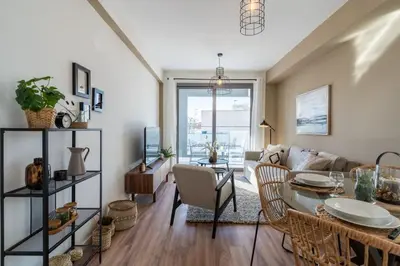 a living room with a table and a couch at Stars 1-Bedroom Apartment in Larnaca in Larnaka