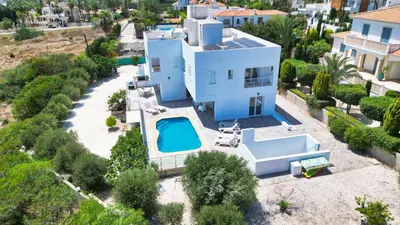 an aerial view of a house with a swimming pool at Villa Christina in Ayia Napa