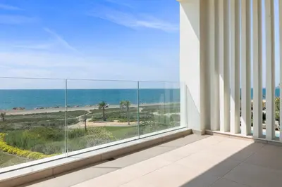 a balcony with a view of the ocean at Serenity Waves Villa 4 in Sophtadhes
