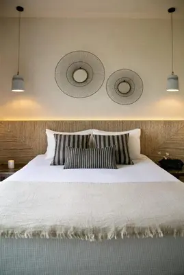 a bedroom with a white bed with two pillows at Amazing Protaras Villa Villa Lubbock 3 Bedrooms Private Outdoor Pool in Protaras