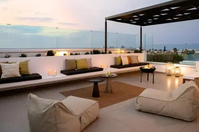 a living room with couches and chairs on a roof at Amazing Protaras Villa Villa Lubbock 3 Bedrooms Private Outdoor Pool in Protaras