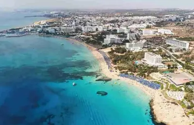 an aerial view of a beach and the ocean at Luxury Protaras Villa Villa Najenda 3 Bedrooms Private Outdoor Pool in Protaras