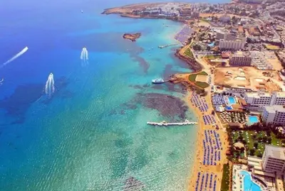 an aerial view of a beach and the ocean at Luxury Protaras Villa Villa Najenda 3 Bedrooms Private Outdoor Pool in Protaras