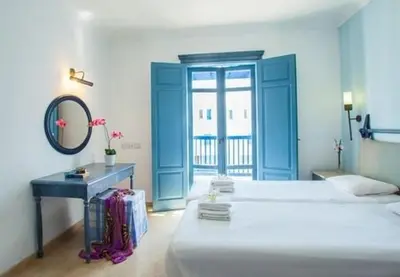 a bedroom with two beds and a mirror and a desk at Premium Protaras Villa Villa Mine 2 Bedrooms Private Outdoor Pool in Protaras