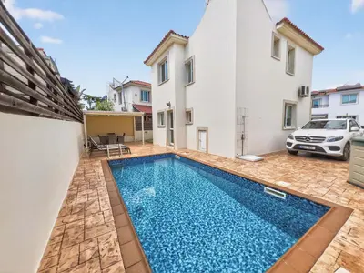 a swimming pool in the backyard of a house at Villa Ioli - 3BR Retreat near Kalamies Beach in Protaras