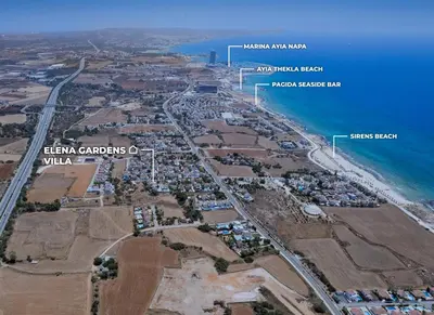 an aerial view of a city and the ocean at Elena Gardens Villa in Ayia Napa