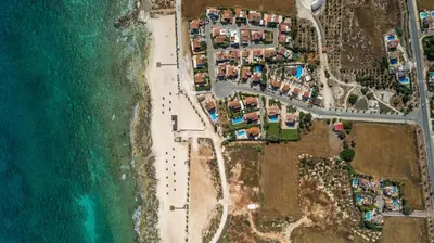an aerial view of a beach and the ocean at Villa Stephanie Oasis in Ayia Napa