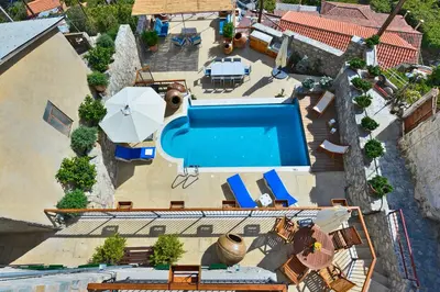 an overhead view of a swimming pool in a resort at Vasilikis House in Kalopanayiotis