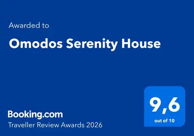 a blue sign with the words mobos security house at Omodos Serenity House in Omodos