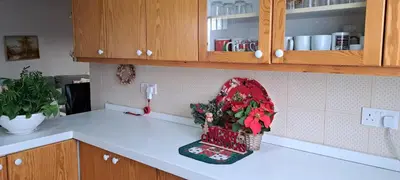 a kitchen counter with a christmas decoration on it at Kyperounta Troodos mountain house in Limassol
