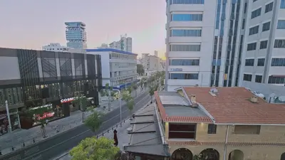 an overhead view of a city street with tall buildings at STAY City Life Apartment I in Nicosia
