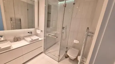 a bathroom with a shower and a toilet and a sink at Del Mar 2 Bedroom Deluxe Seaside 'A' Residence in Limassol