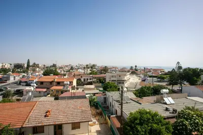 an aerial view of a city with buildings at Palmove Newly Build Seaview Apt in Larnaka