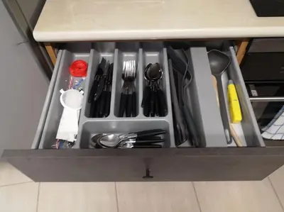 a drawer filled with utensils in a kitchen at Yippee! at Ermou Square Amazing Location View in Larnaka