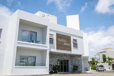 a white building with a sign on it at Bellini Hotel in Ayia Napa