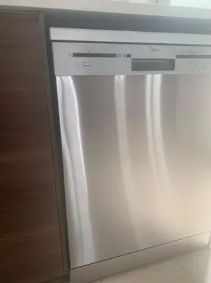 a white refrigerator with its door open in a kitchen at Maison Diana - Tourism license 6990 in Protaras