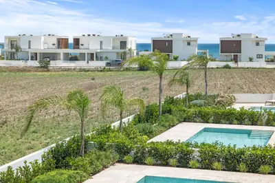 an aerial view of a house with a swimming pool at Serenity Waves Villa 19 in Larnaka