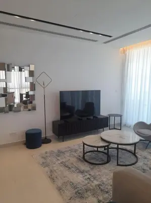 a living room with a couch and a table at 360 Nicosia-2 Bedroom City Tower in Nicosia