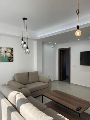 a living room with a couch and a coffee table at Pervolia Oasis Villa in Kiti