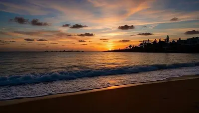 a sunset on the beach with the ocean at Apartment Veronika in Paralimni