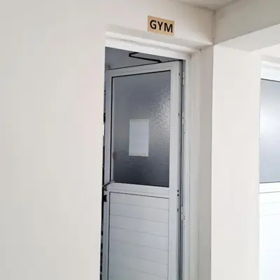 a door in a room with a sign on it at CyPresa Sweet Home Oroklini in Larnaka