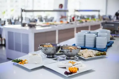 a kitchen with two plates of food on a table at Cyprotel Florida in Ayia Napa